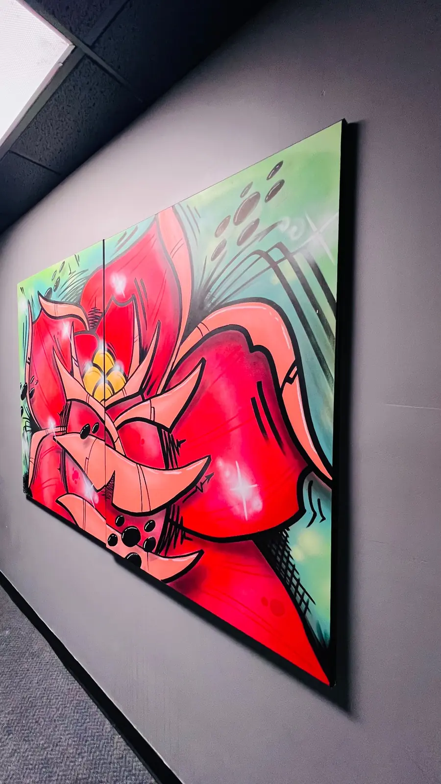 Colorful artwork along the interior hallway at EMP Country Club