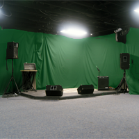 Thumbnail of rehearsal stage with green-screen backdrop added.