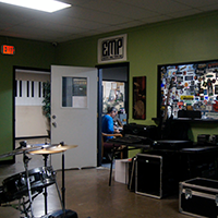 Pic of owner Omar Gomez in the office of the Fort Worth rehearsal facility.