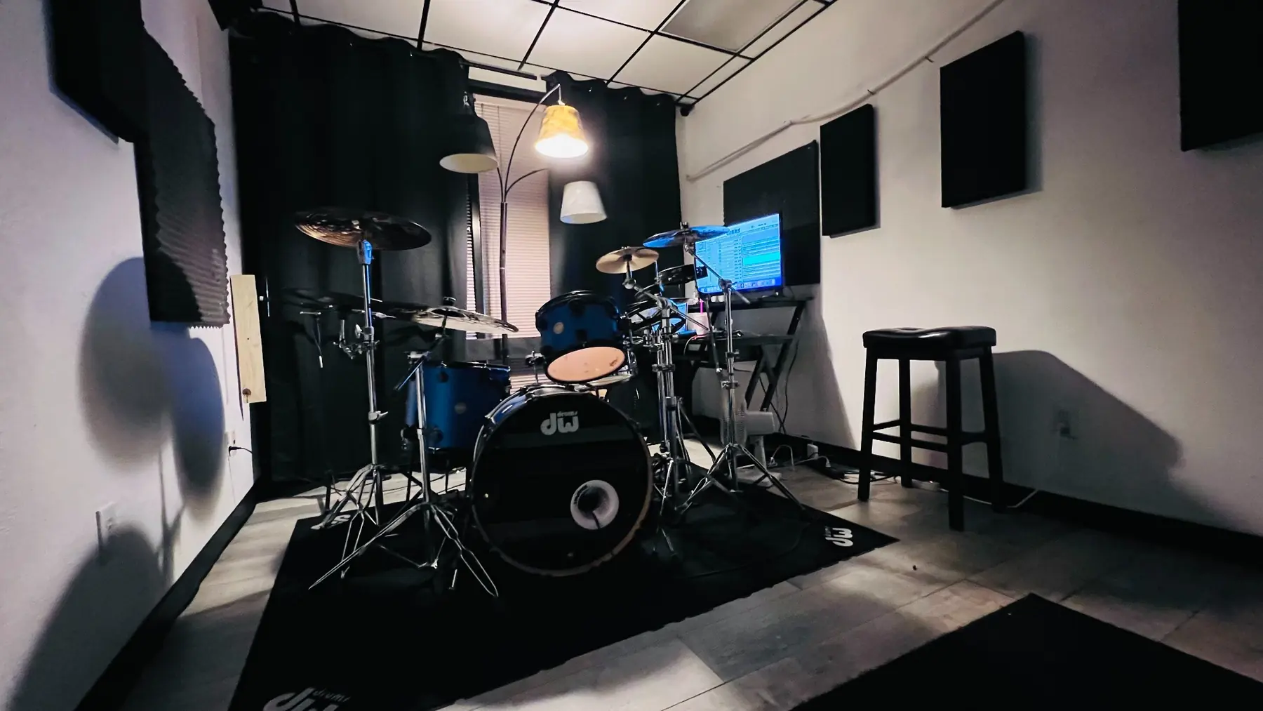 Detailed view of the small EMP hourly room shown with a drum kit